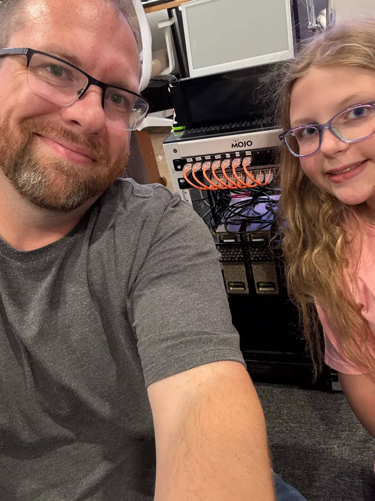 Shannon and his daughter beside the mini cluster they built together.